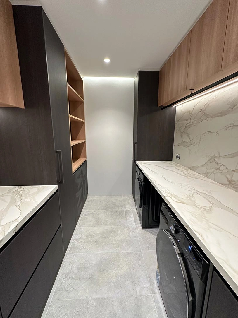 A modern laundry area with a washer and dryer